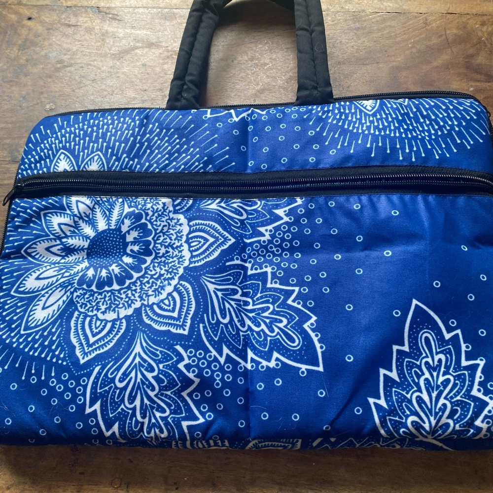 Free with any purchase! Handmade Blue Floral Laptop Bag in great condition!